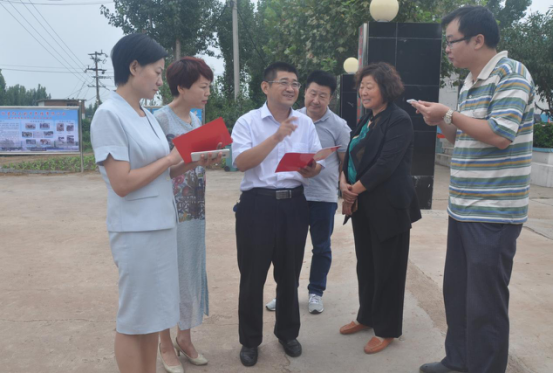 图为市残联理事长张修占到泗水县调研残疾人工作